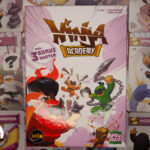 Ninja Academy im Mittelpunkt und im Hintergrund verschiedene Aufgabenkarten
