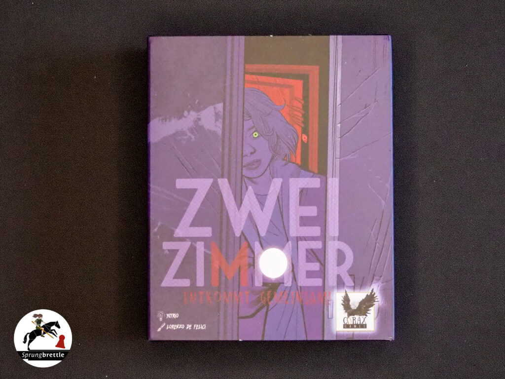 Zwei Zimmer Spielschachtel auf schwarzem Hintergrund.